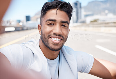 Buy stock photo Happy, selfie and fitness with man in city for social media, profile picture and running. Smile, workout and relax with portrait of male runner and photo in road for exercise, training and freedom