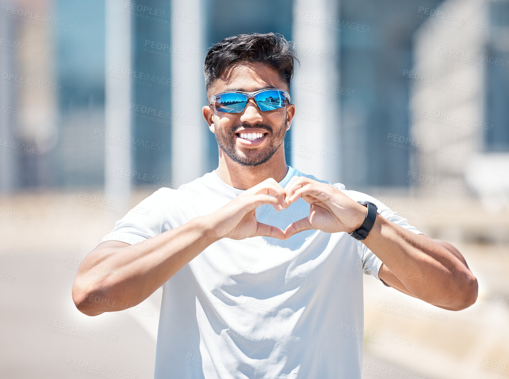 Buy stock photo Man, smile in portrait and heart hands, athlete outdoor and sports, fitness with health and wellness. Healthy male person happy in city, self love and care with cardio, exercise with emoji or sign