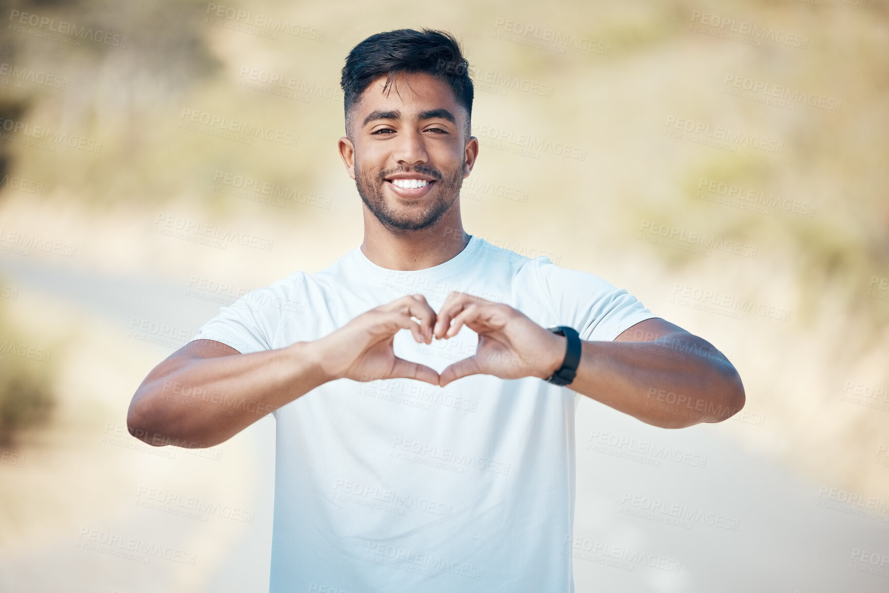 Buy stock photo Happy man, fitness and portrait with heart hands in nature for cardio health or workout exercise outdoors. Fit, active or sport male person, athlete or runner with loving emoji and smile for training