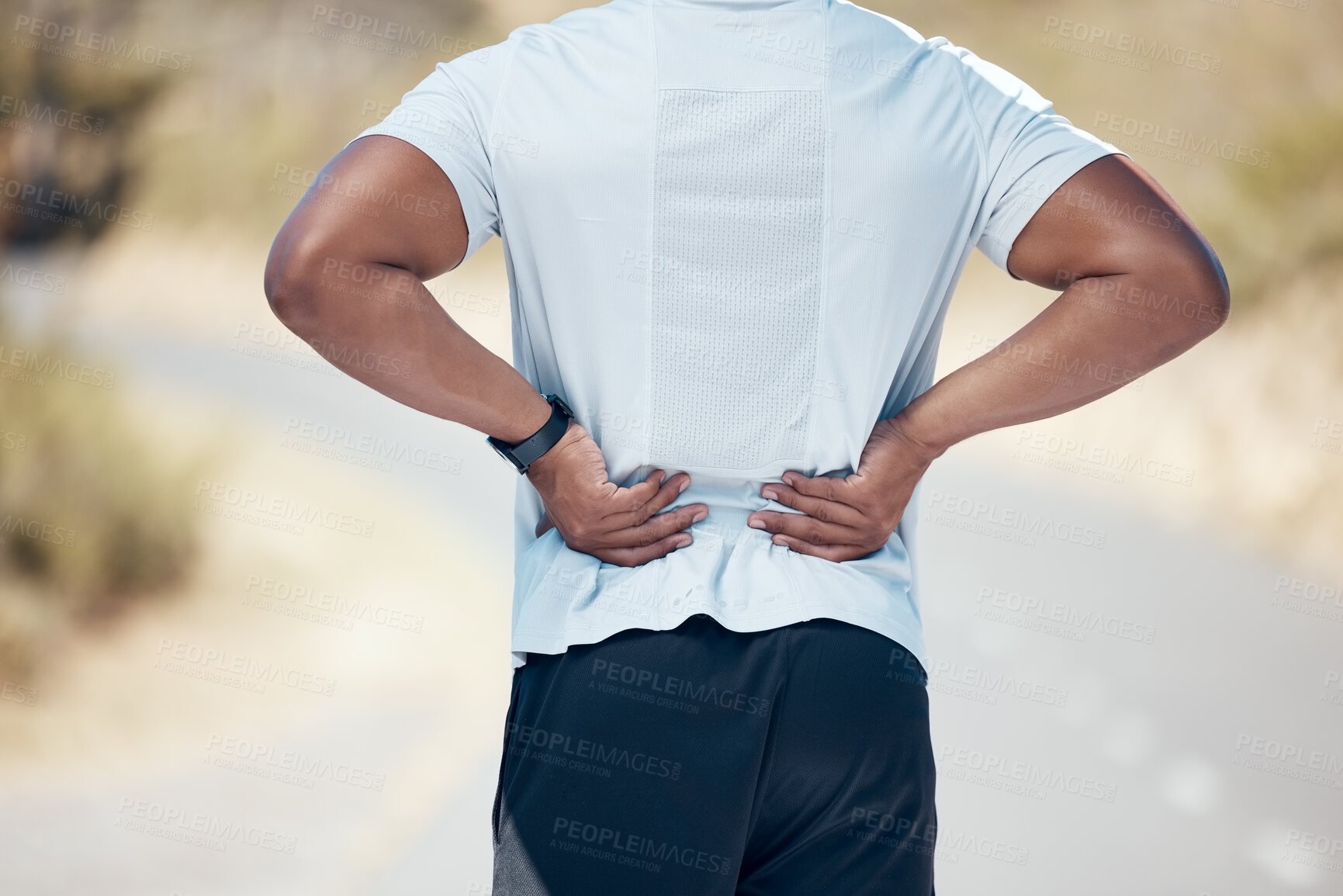 Buy stock photo Back pain, fitness and man on the road, training and exercise with muscle tension, strain and emergency. Male person, guy and athlete with joint injury, outdoor and accident with a health problem