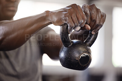 Buy stock photo Kettlebell, hands and exercise with a man at gym for fitness, training and strong muscle growth. Athlete or bodybuilder person at club for iron weights workout for power and performance with powder