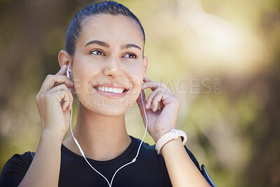 Buy stock photo Earphones, runner or happy woman streaming music to start training, workout or running exercise in park. Smile, thinking or healthy sports girl athlete listening to radio or podcast about fitness 