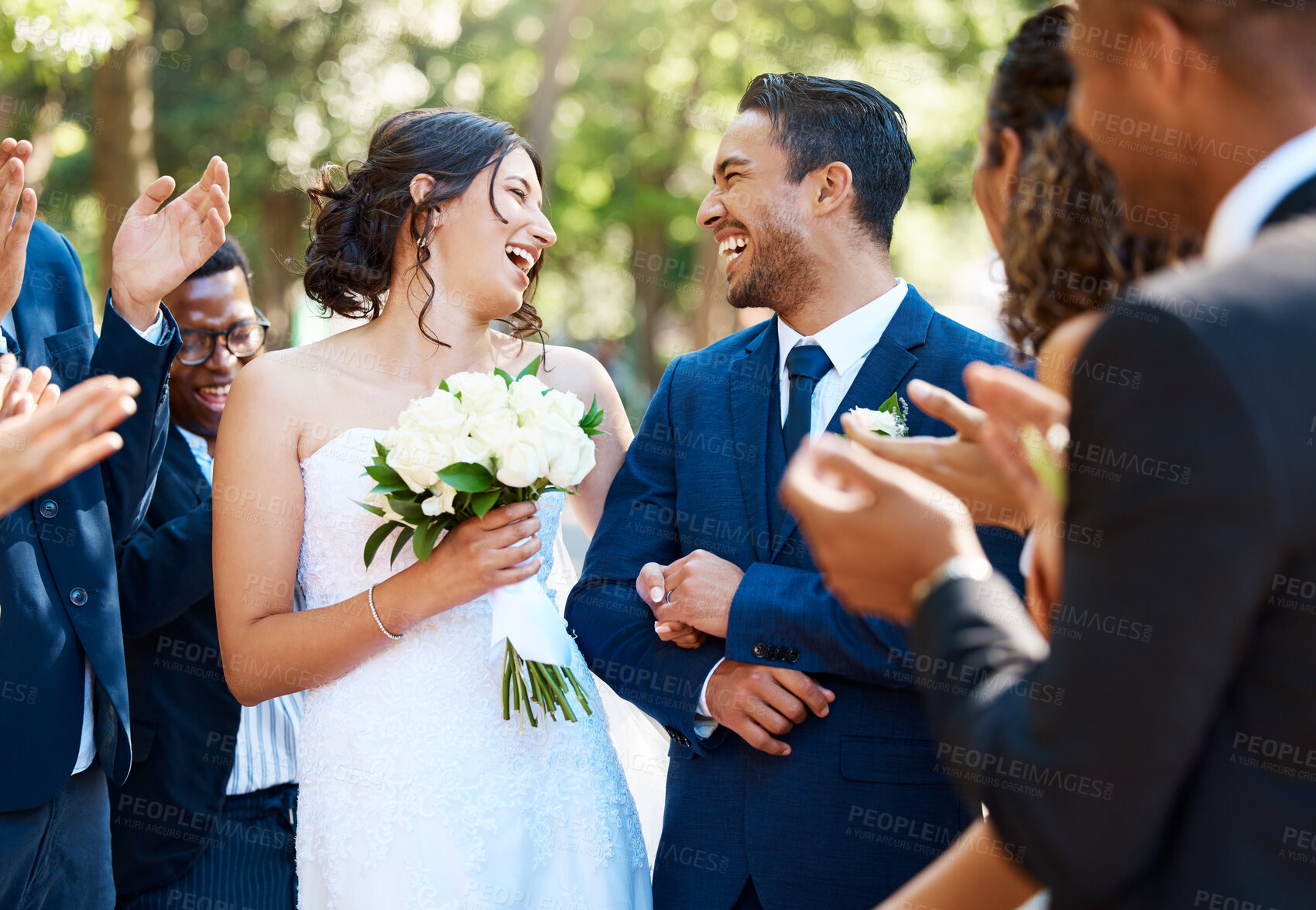 Buy stock photo Wedding ceremony, couple and people clapping hands in celebration of love, romance and union. Happy, smile and bride with bouquet and groom walking by guests cheering for marriage at an outdoor event