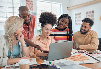 Buy stock photo Group of diverse businesspeople having a meeting in a modern office at work. Young mixed race businesswoman talking to her colleagues while using a laptop. Creative coworkers planning together