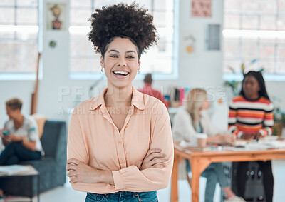 Buy stock photo Young cheerful mixed race businesswoman standing with her arms crossed while in an office. Confident hispanic female manager with a curly afro smiling and standing at work