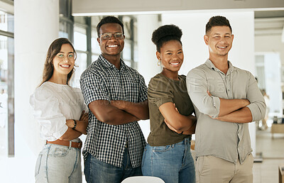Buy stock photo Portrait of successful creative business team looking at camera and smiling. Diverse business people standing together with their arms crossed at startup