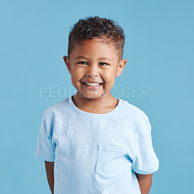 Buy stock photo Happy, portrait and a child with a smile for dental care isolated on a blue background in a studio. Smile, kindergarten and a little boy kid smiling with happiness about young oral hygiene results