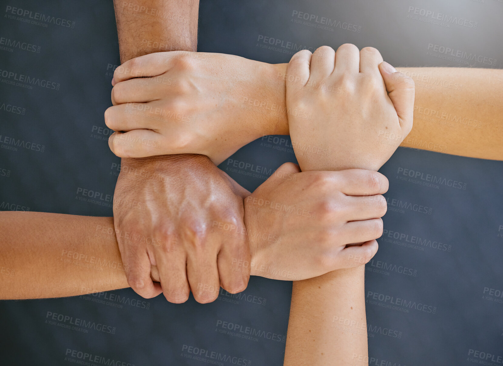 Buy stock photo Hands are together, link and support with solidarity closeup, team and motivation with community and connection. Top view of group huddle, collaboration and unity with respect, trust and teamwork