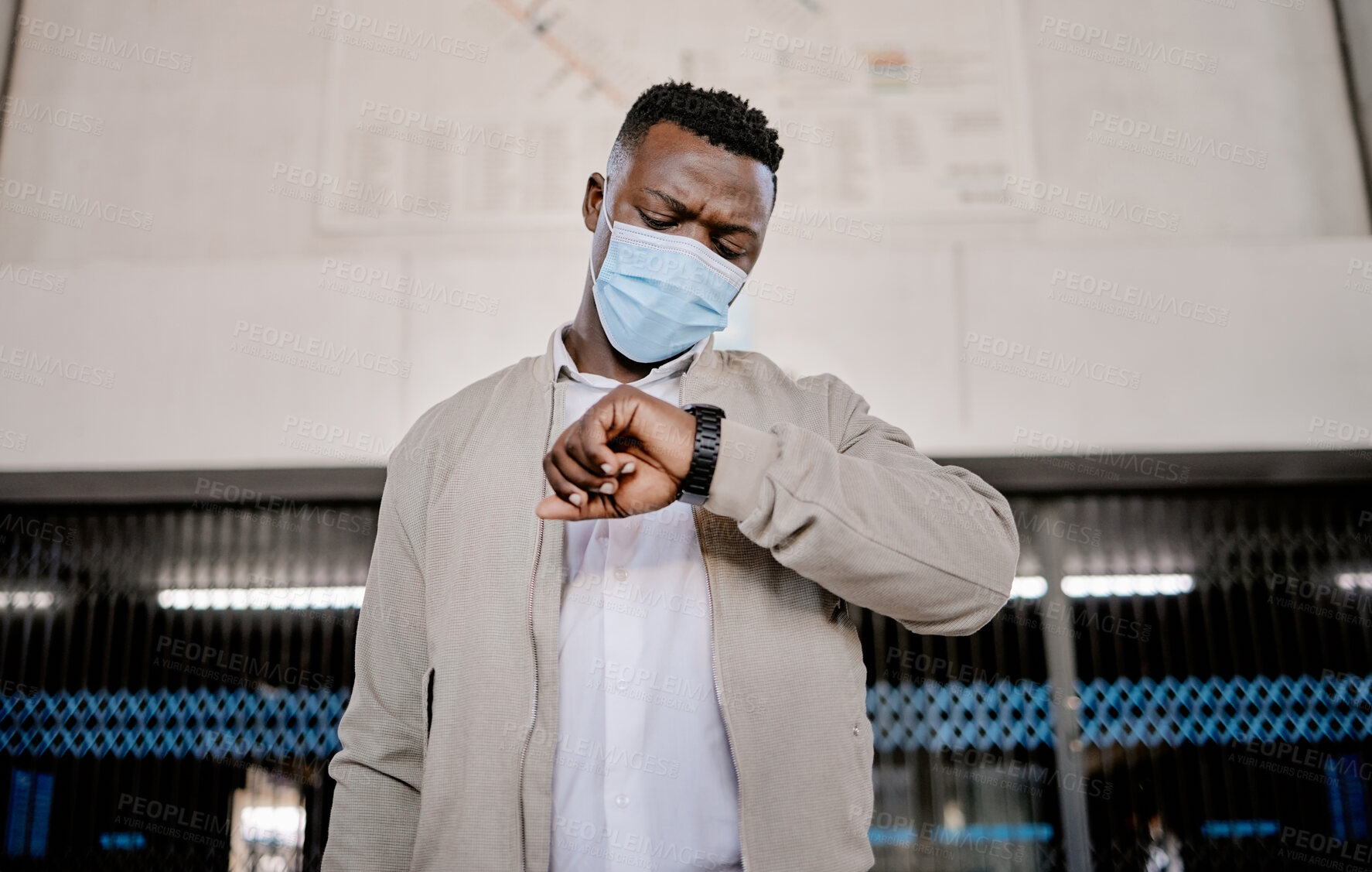 Buy stock photo Black man, mask and check watch at airport with time, schedule and terminal with safety on global travel. Person, thinking and ppe with clock, reminder and direction for international business trip