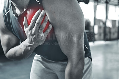Buy stock photo Is this a heart attack? Trainer experiencing chest pains at the gym. Hand of a bodybuilder touching his chest in pain. Red CGI spots are used to show pain. Your heart may be in danger with exercise