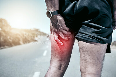 Closeup fit mixed race man holding his leg in pain while exercising outdoors. Unrecognizable male athlete suffering with a muscle hamstring injury highlighted by cgi. You can get hurt during a workout