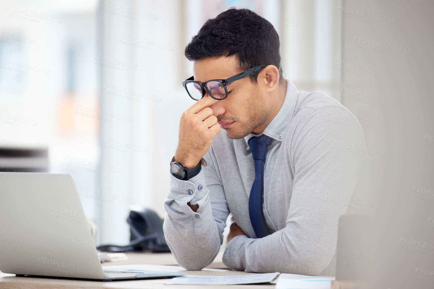 Buy stock photo Stress, headache and business man on laptop for debt review, financial mistake and company crisis or fail. Computer, online taxes and audit employee, accountant or person with depression or problem