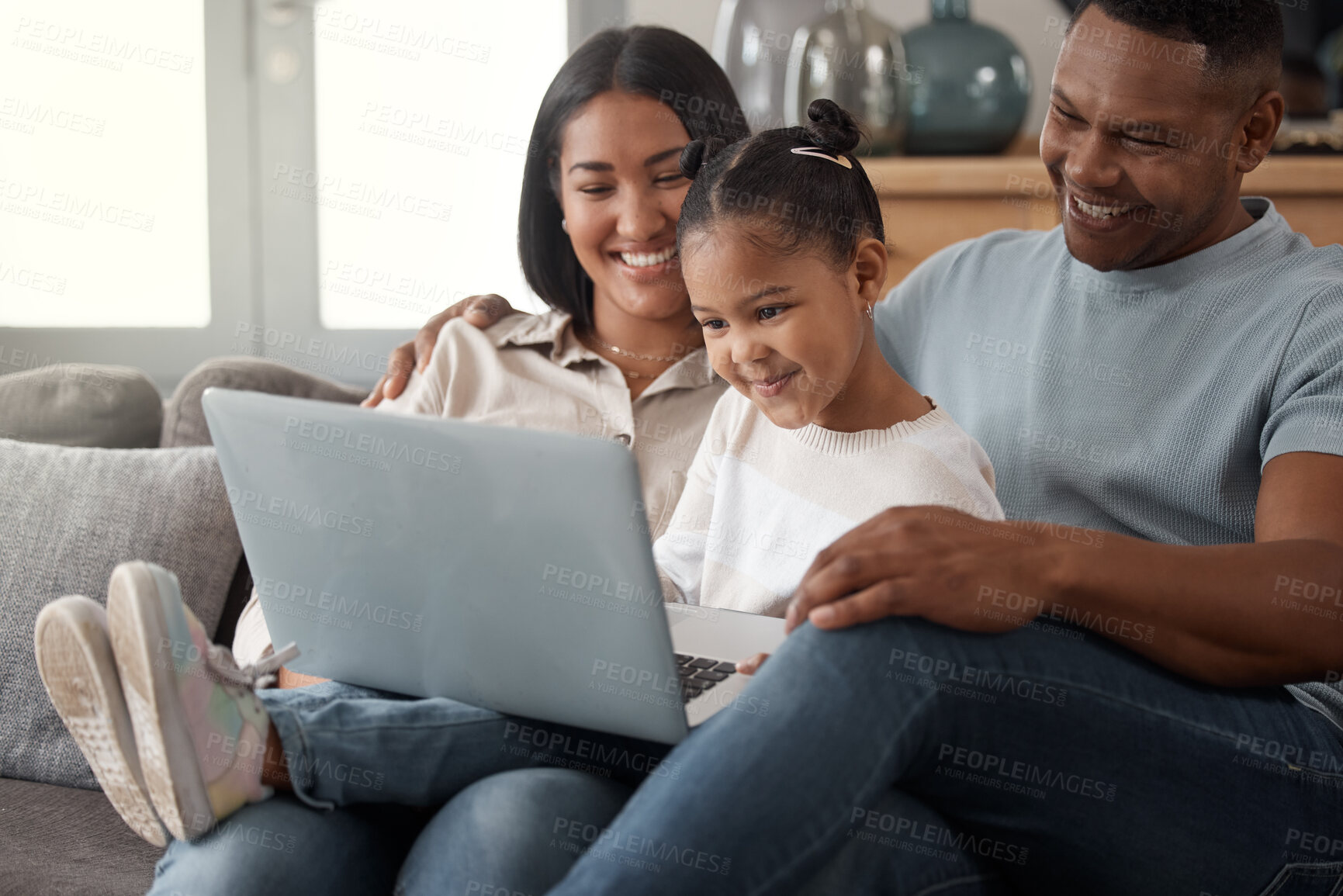 Buy stock photo Happy, family and relax on sofa with laptop in home, living room for watching, streaming movie or website. Black parents, girl and watch cartoon, movies together on technology, computer or screen