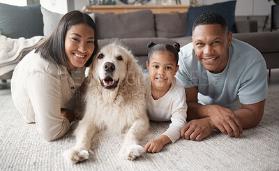 Buy stock photo Parents, girl and dog on floor, portrait and smile with love, care and bonding in living room at family home. Father, mother and daughter with pet animal, happiness or relax together on lounge carpet