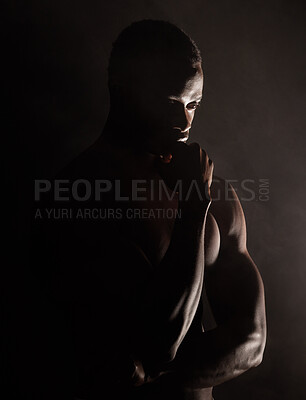 Buy stock photo Black man, muscle silhouette and studio for thinking, anxiety and depression with art deco vision. Model, art aesthetic and depressed with strong body, alone or suffering with mental health in shadow
