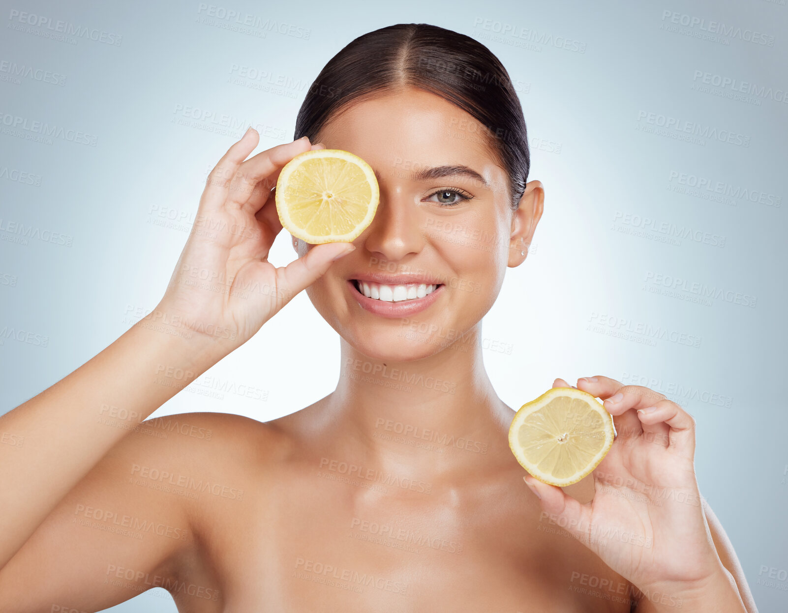 Buy stock photo Face, skincare and smile of woman with lemon in studio isolated on a white background. Portrait, natural and female model with fruit for vitamin c, nutrition or healthy diet, wellness or cosmetics.