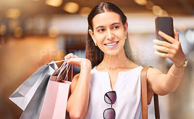 Buy stock photo Selfie, shopping bag and a woman with a smile in mall for fashion, sale or influencer discount deal. Person or happy customer with retail bags and smartphone for online promotion and ambassador photo