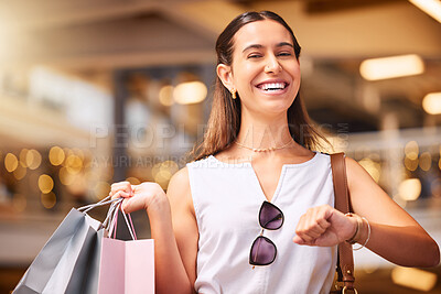 Buy stock photo Laughing, portrait and a woman with a shopping bag in mall for fashion, sale or discount deal. Female person or happy customer with retail bags, watch and time for promotion offer on designer product