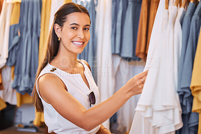 Buy stock photo Shopping, clothes choice and a woman in boutique or mall for fashion, sale or discount deal. Portrait of female person or happy customer in retail store for promotion offer or luxury brand on hanger
