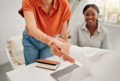 Buy stock photo Business people with a handshake in the office for corporate deal, partnership or collaboration. Meeting, welcome and closeup of female employees shaking hands for an onboarding, hiring or agreement.