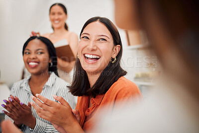 Buy stock photo Happy young hispanic businesswoman clapping hands during a meeting in an office boardroom with colleagues. Cheerful excited woman applauding to celebrate an inspiring presentation and successful deal in a creative startup agency