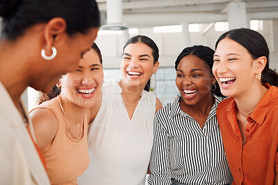 Buy stock photo Diverse group of five cheerful businesswomen having a meeting together in at work. Joyful businesspeople talking and laughing while standing in an office