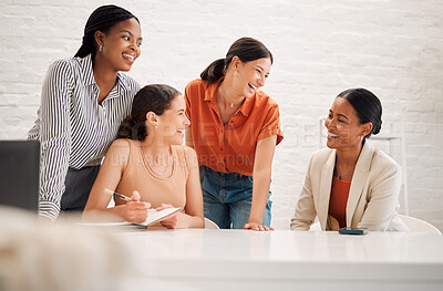 Buy stock photo Group of happy diverse businesswomen having a meeting together in a boardroom at work. Cheerful businesspeople talking and planning in a workshop in an office
