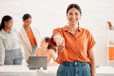 Buy stock photo Young happy mixed race businesswoman showing a thumbs up in an office at work. Pleased cheerful hispanic businessperson making a hand gesture showing support in a meeting at work
