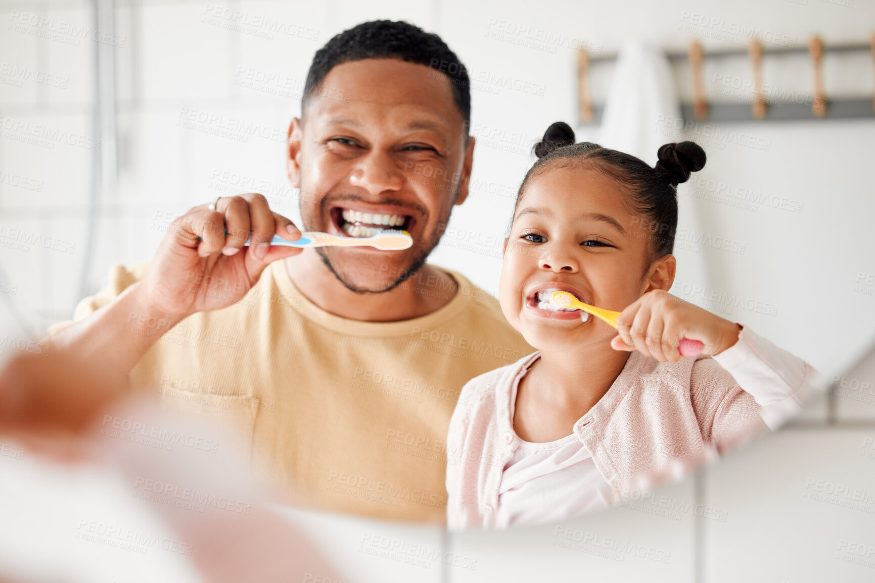 Buy stock photo Child, dad and brushing teeth in a family home bathroom for dental health and wellness in a mirror. Face of african man and girl kid learning to clean mouth with toothbrush and smile for oral hygiene