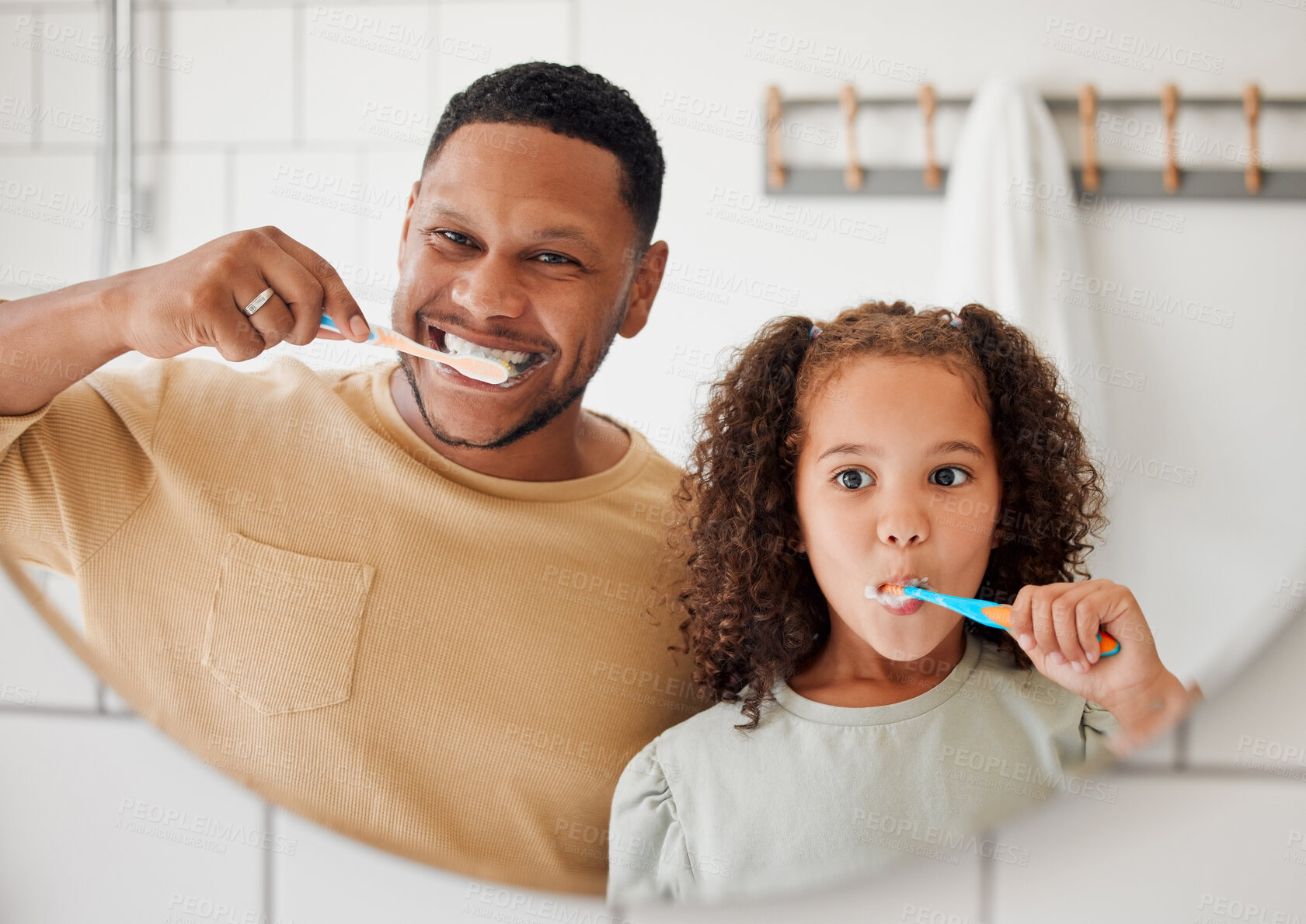 Buy stock photo Child, father and brushing teeth in a family home bathroom for dental health. Face of happy african man and girl kid learning to clean mouth with toothbrush in mirror for morning routine or oral care