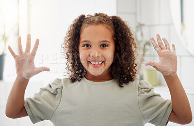 Buy stock photo One mixed race adorable little girl washing her hands in a  bathroom at home. A happy Hispanic child with healthy daily habits to prevent the spread of germs, bacteria and illness