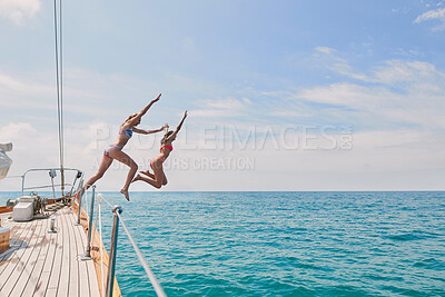 Buy stock photo Energy, sailing and friends jumping off a yacht together into the ocean for freedom, fun or swimming. Travel, summer and bikini with girls leaving a boat to jump into the sea while on a luxury cruise