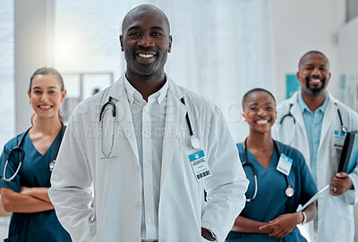 Buy stock photo Happy, doctor and portrait of black man with team for medical help, insurance and trust in clinic. Healthcare, hospital and professional male and women health worker for service, consulting and care