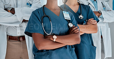 Buy stock photo Group, doctors and arms crossed in hospital, teamwork and solidarity with women, men and support for healthcare. Doctor, team and people with stethoscope, medical collaboration and together in clinic