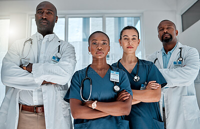 Buy stock photo Group, doctors and portrait with arms crossed, hospital or teamwork for solidarity, women and men for healthcare. Nurses, team and people with diversity, medical collaboration and serious in clinic