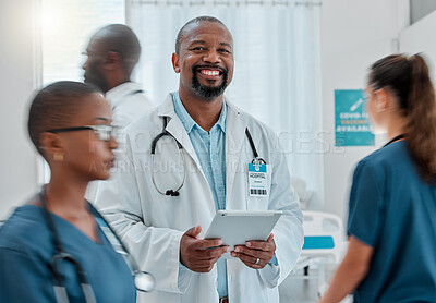 Buy stock photo Busy hospital, tablet and portrait of doctor for medical care, wellness app and support with blur of people. Healthcare, digital tech and happy black man for service, consulting and health insurance