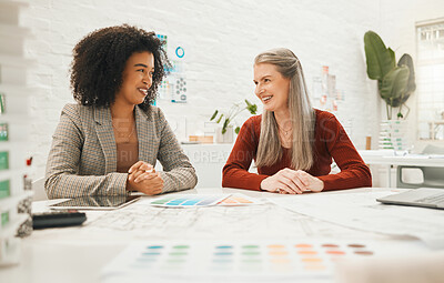 Buy stock photo Team of designers working together. Happy colleagues collaborate in a meeting. Team of designers brainstorm on building blueprint. Smiling coworkers working together in an agency.