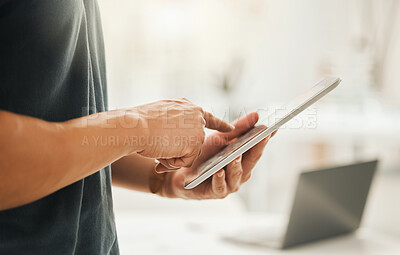 Buy stock photo Closeup of a businessman using a digital tablet. Hands of architect working online on a wireless device. Hands of businessman scrolling online apps on a tablet. Startup designer using his device
