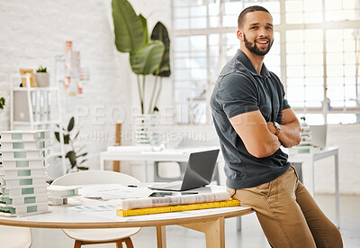 Buy stock photo Young entrepreneur in his design office. Happy architect in his design agency. Creative entrepreneur standing in his office. Proud, confident businessman in his office. Proud boss in his office
