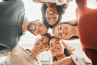 Buy stock photo Portrait of businesspeople huddled together. Diverse group of businesspeople from below. Happy corporate coworkers from below. Architects smiling from below. Professional businesspeople together