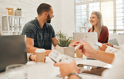 Buy stock photo Businesspeople laughing during a meeting.Cheerful colleagues in a meeting. Mature businesswoman laughing with young coworker. Group of businesspeople collaborate in a meeting.
