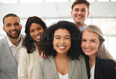 Buy stock photo Portrait of a group of happy diverse businesspeople standing together in an office. Confident team of five business professionals at work