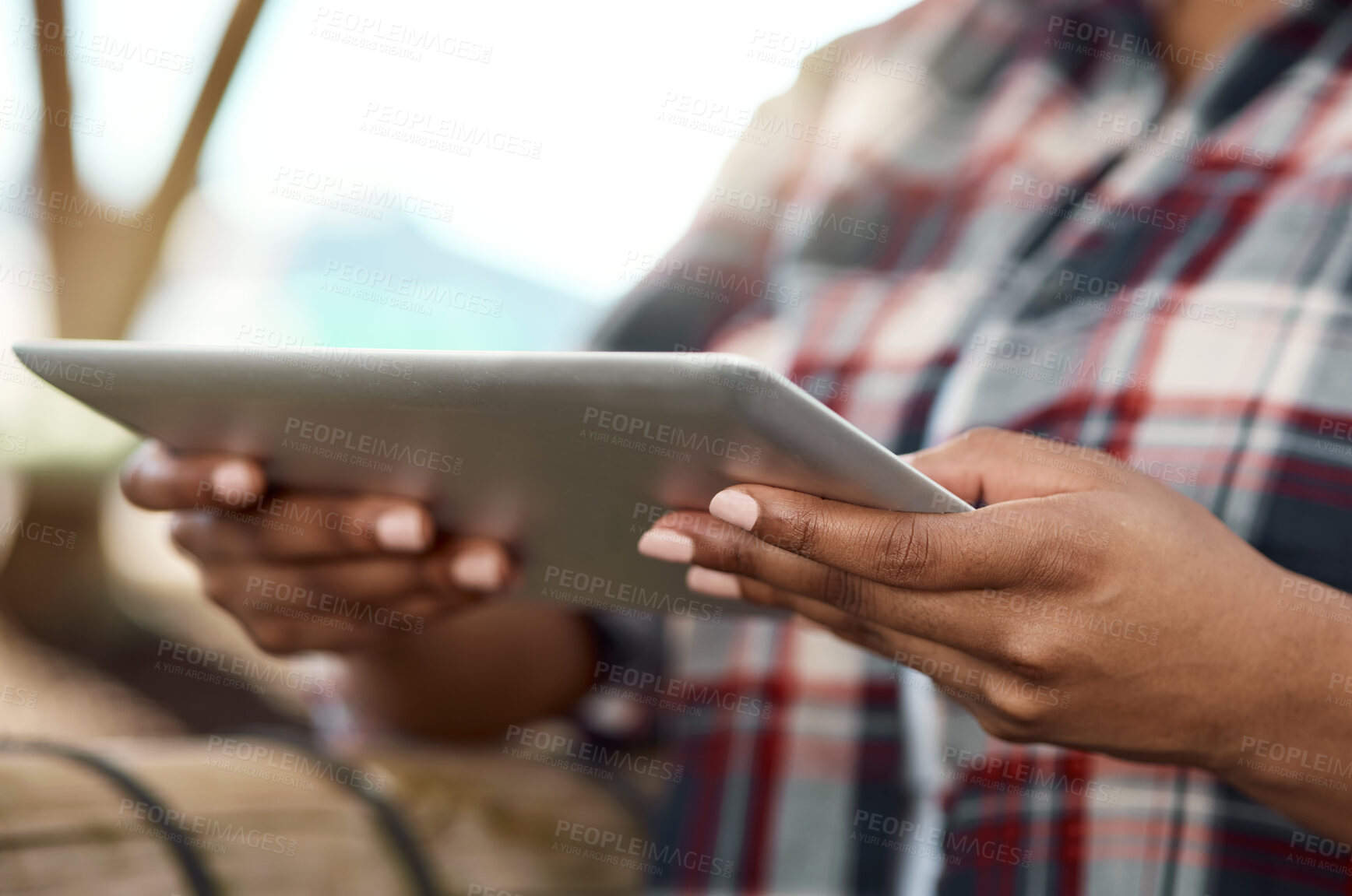 Buy stock photo Closeup of farmer using digital tablet. Hands of farm worker using a digital device. African american farmer using a wireless digital device. Farmer using a tablet in a greenhouse.