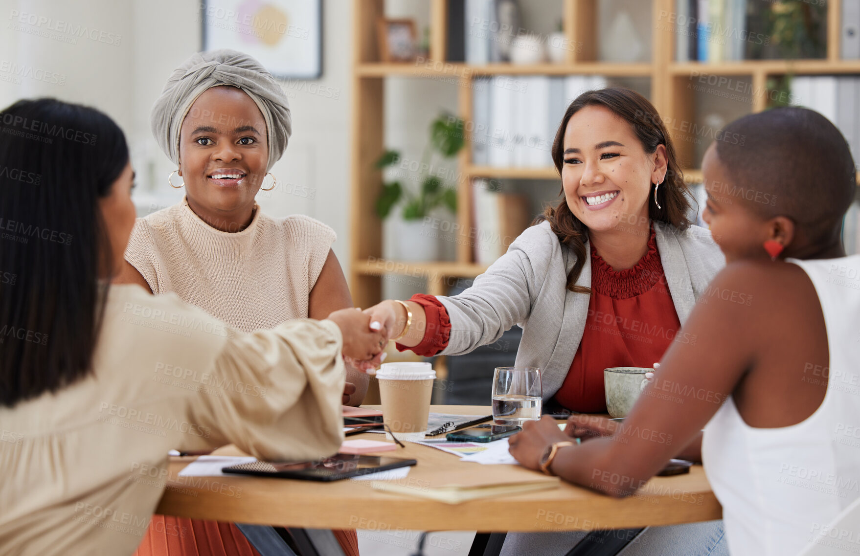 Buy stock photo Partnership, handshake and collaboration of business women in office for deal, onboarding or agreement. Welcome, meeting and group of happy people shaking hands for introduction or congratulations.