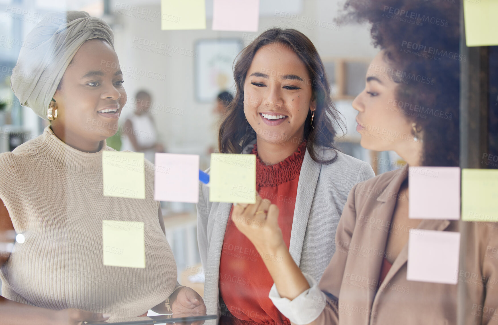 Buy stock photo Team, brainstorming and diversity, business people at board and writing ideas, sticky note on glass with collaboration. Planning, meeting and women work together, female group and teamwork strategy