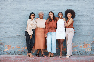 Buy stock photo Portrait, group and business women smile standing on brick wall with mockup outdoors in city. Cooperation, teamwork hug and diversity, collaboration and friends, people and employees with happiness.