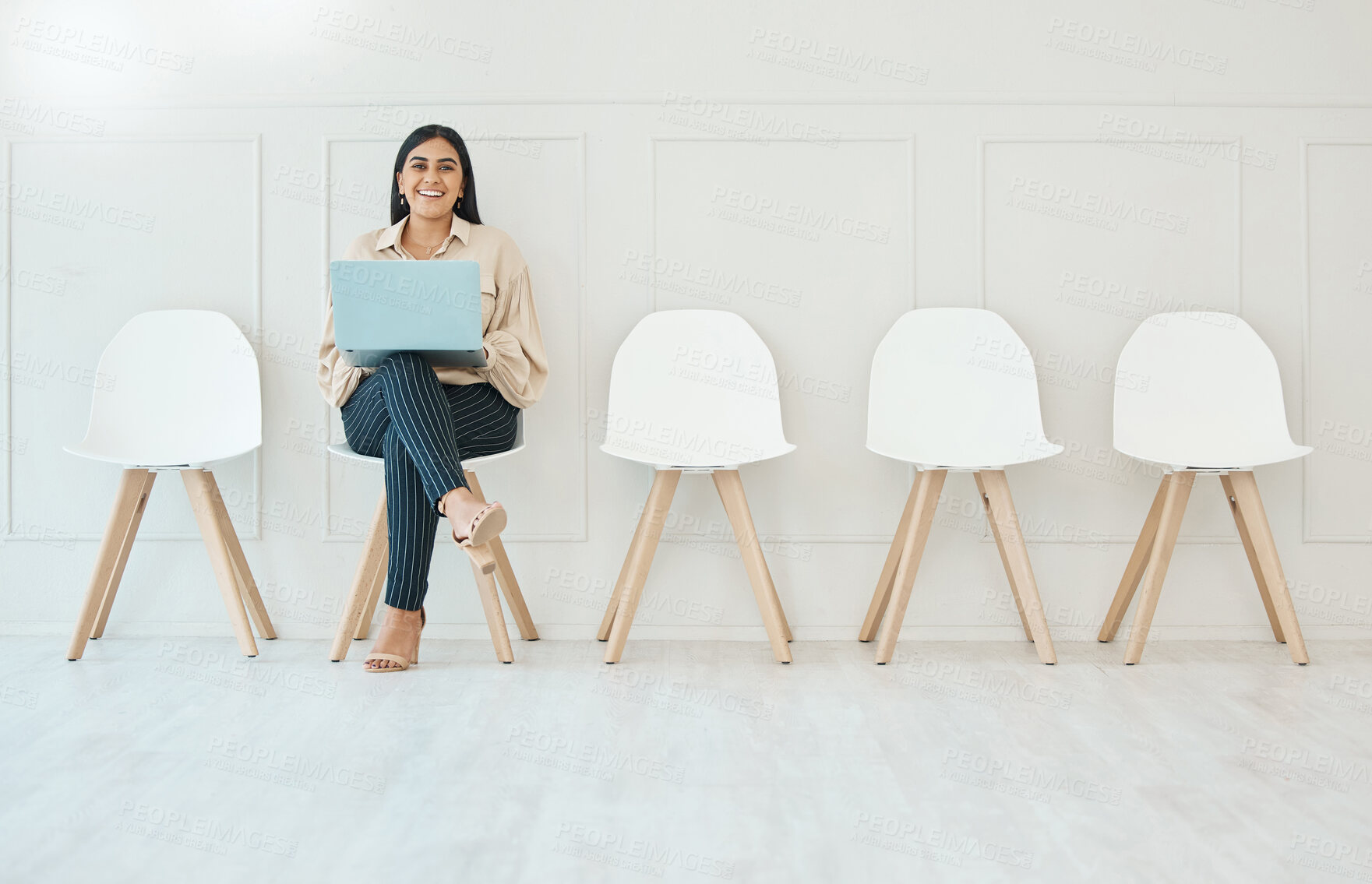 Buy stock photo Portrait, laptop and woman in waiting room, interview or recruitment, hiring or office job. Computer, hr and happy business person or female from India sitting on chair for employment in workplace