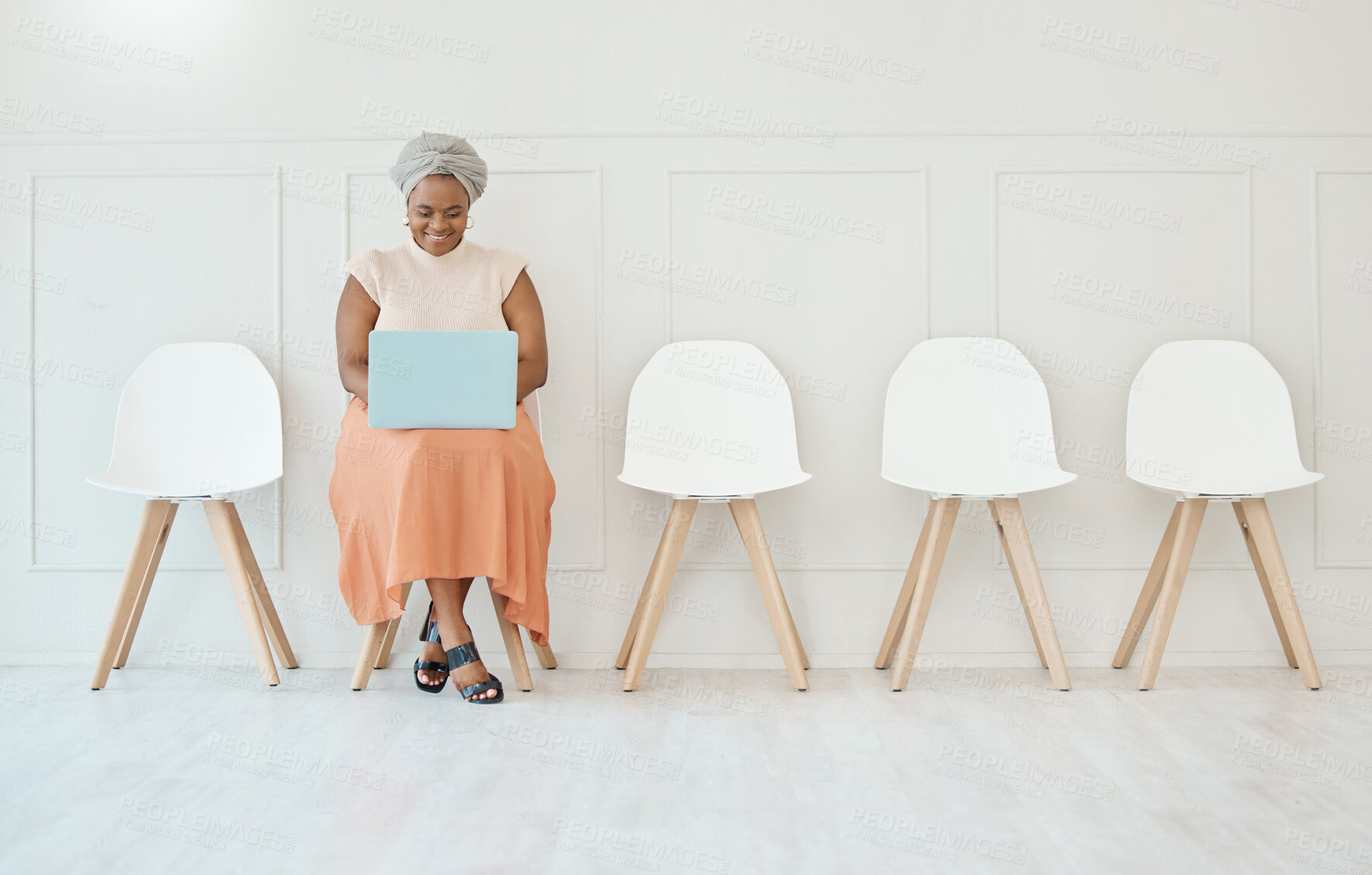 Buy stock photo Happy, recruitment and a black woman in a waiting room with a laptop typing an email. Smile, business and an African corporate employee with a computer for an interview, job search and reading notes