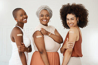 Buy stock photo Happy, portrait and women excited about vaccine isolated on a white background in a studio. Covid, plaster and corporate employees or friends together after getting vaccinated for office compliance