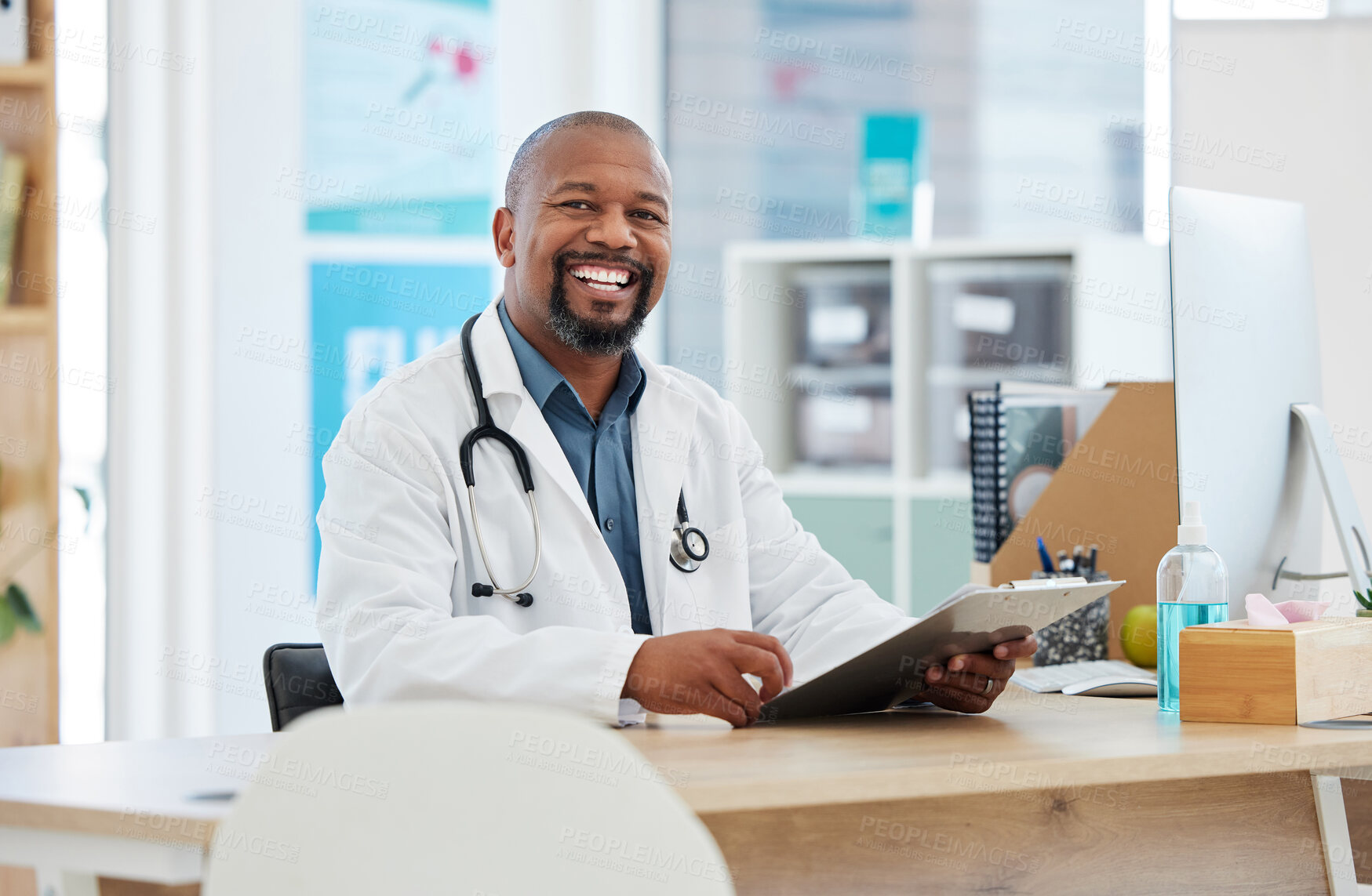 Buy stock photo Healthcare, portrait and black man doctor in his office with a clipboard to analyze test results. Success, smile and professional African male medical worker working on a diagnosis in medicare clinic